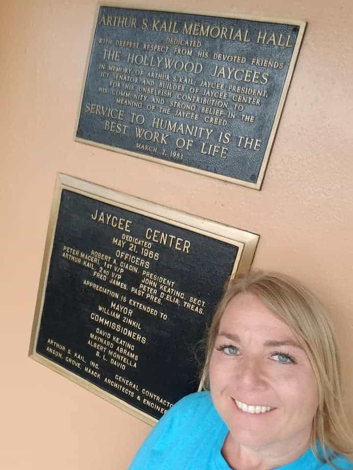 JCUSA President Tricia Buehne in front of the JCI Hollywood HQ -- Note some of the names on those plaques!