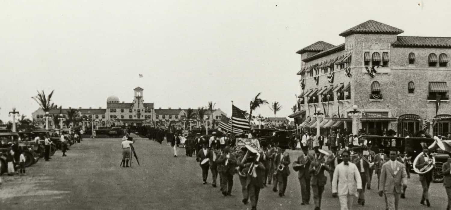 Great Southern Hotel at right on Hollywood Boulevard overlooking Circle Park, with the Park View Hotel opposite, both decorated for July 4th, 1925. Courtesy Hollywood Historical Society.